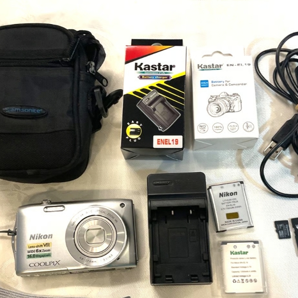 Nikon Coolpix Silver Camera with Accessories